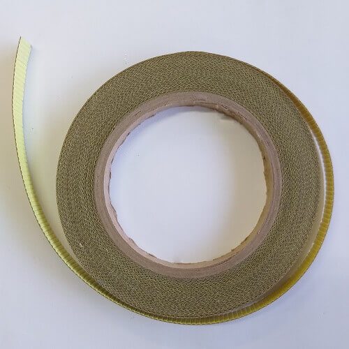 Fita com revestimento PTFE e adesivo